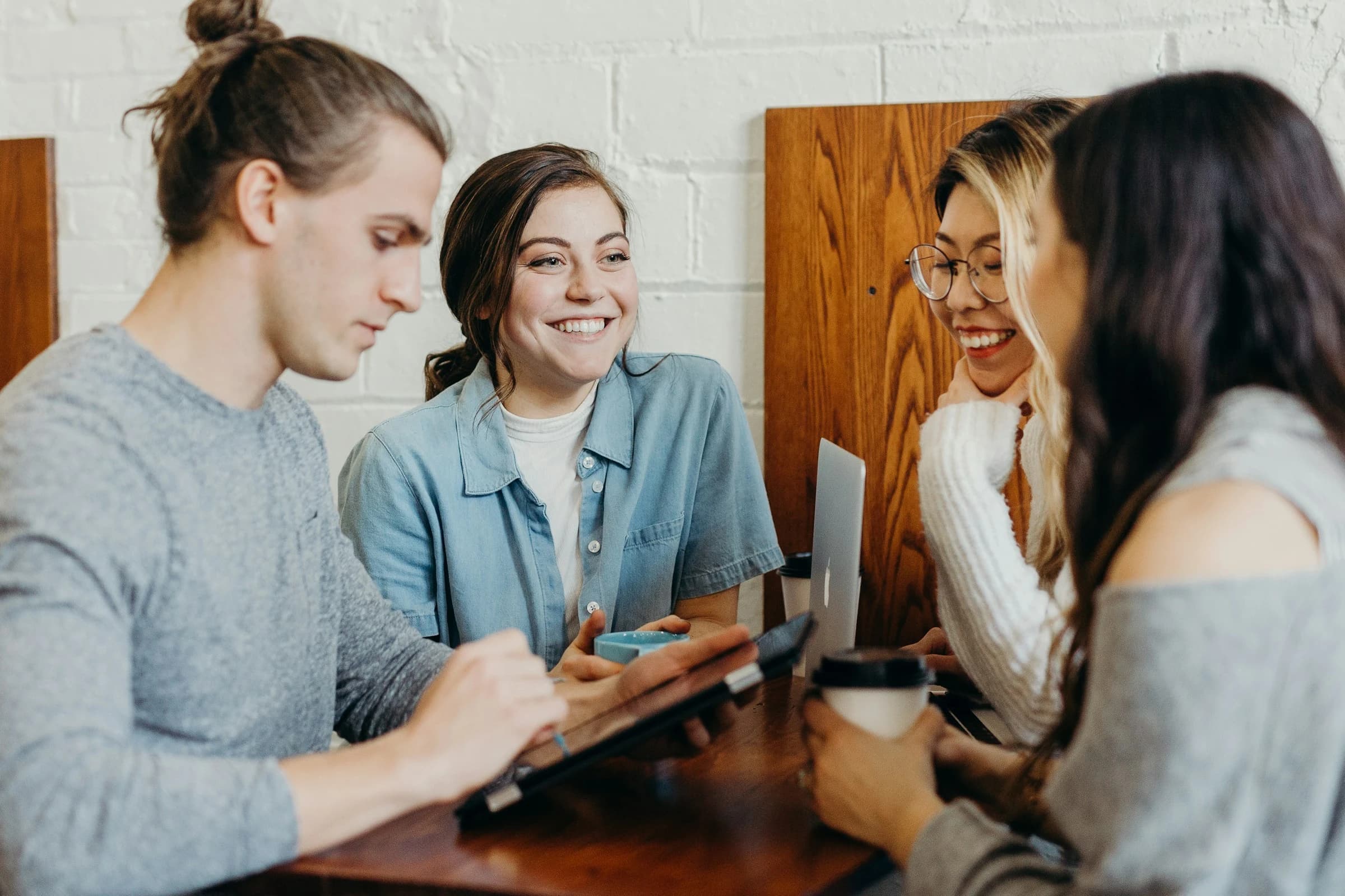 team looking at benefits - Shopify Newsletter Popup App