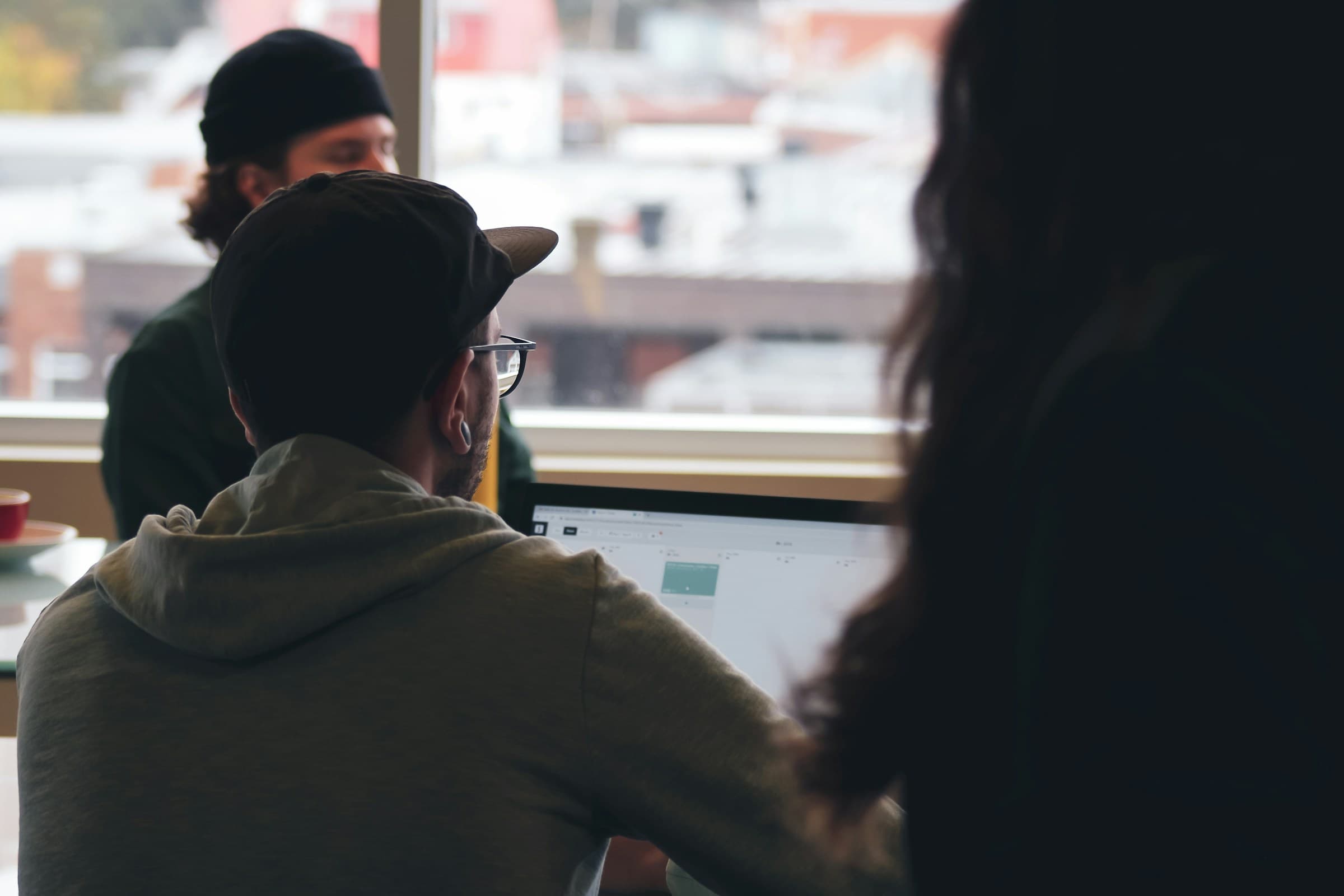 man making custom changes - Custom CSS Shopify