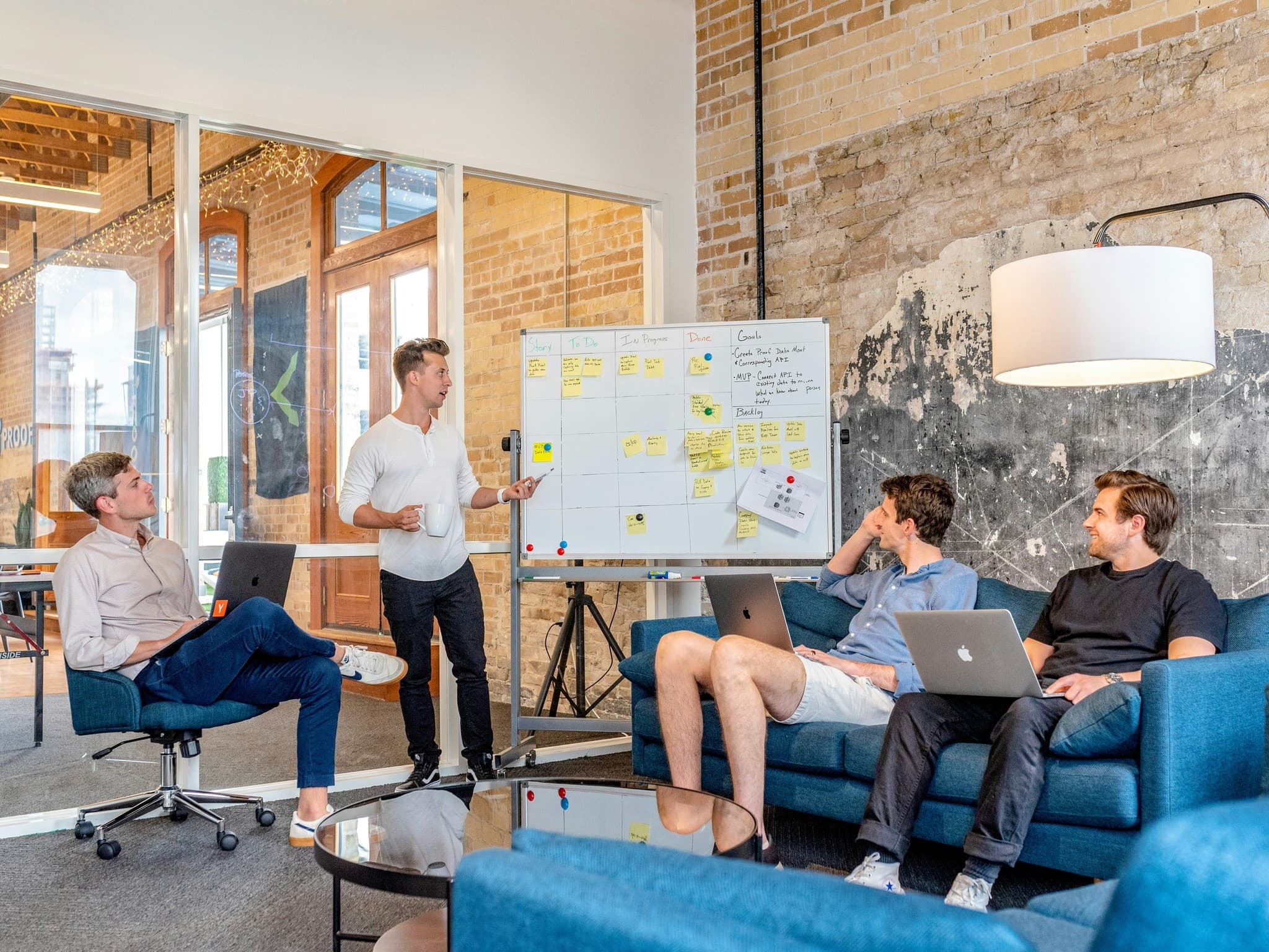 People in Meeting - How To Build A Shopify Store