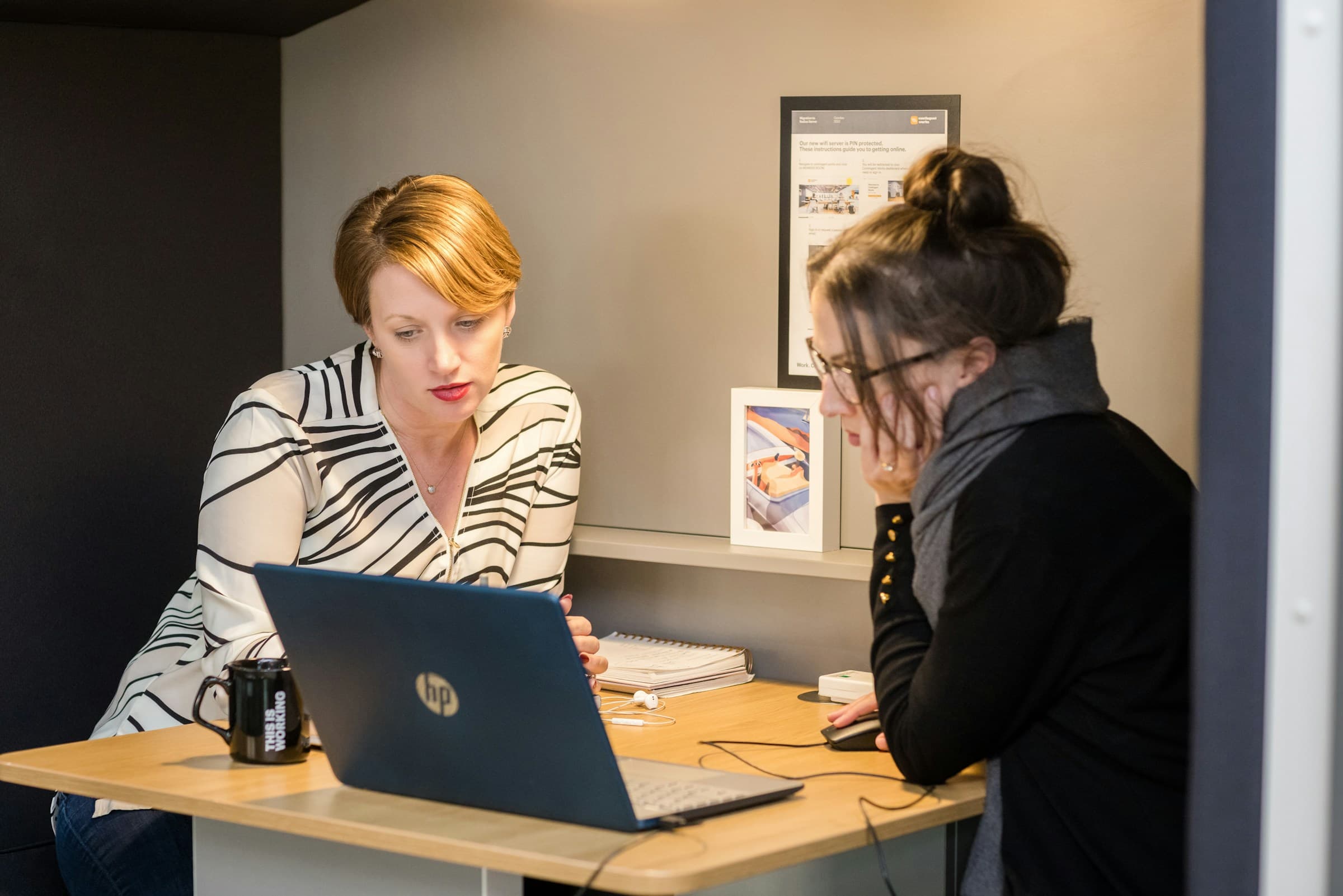 person looking at laptop - Shopify UX