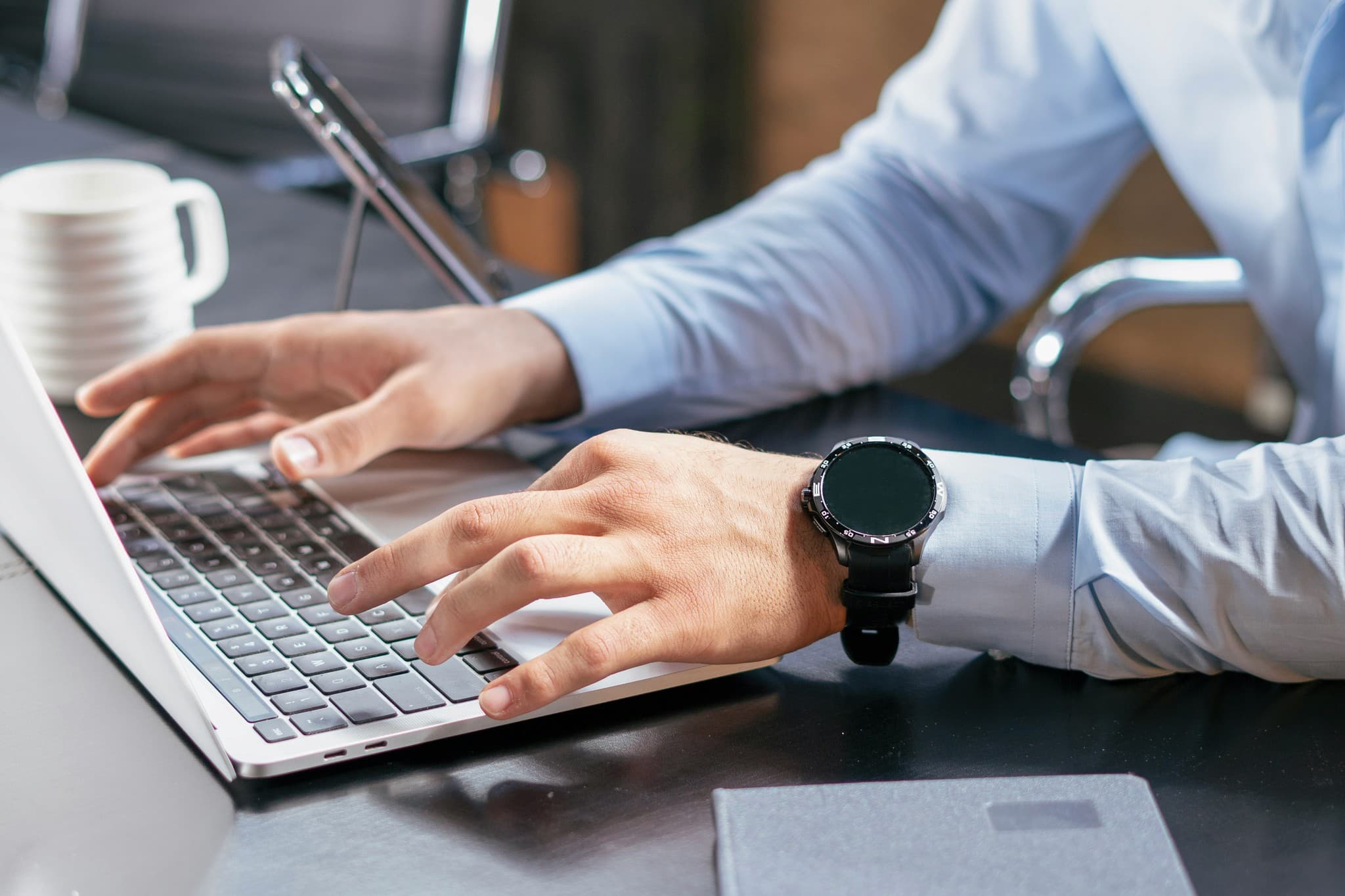person typing on laptop - How to Add Custom Popup in Shopify