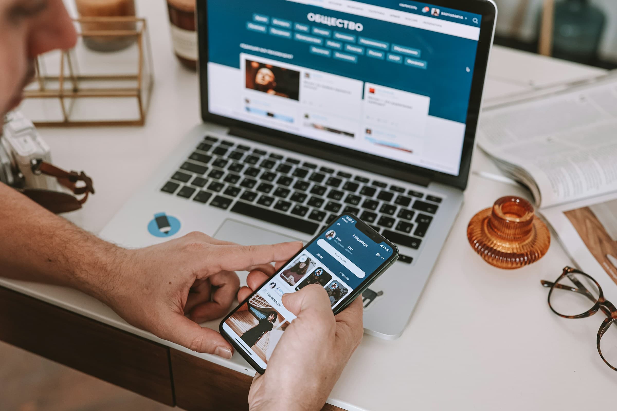 person scrolling on mobile - Shopify Blog Templates