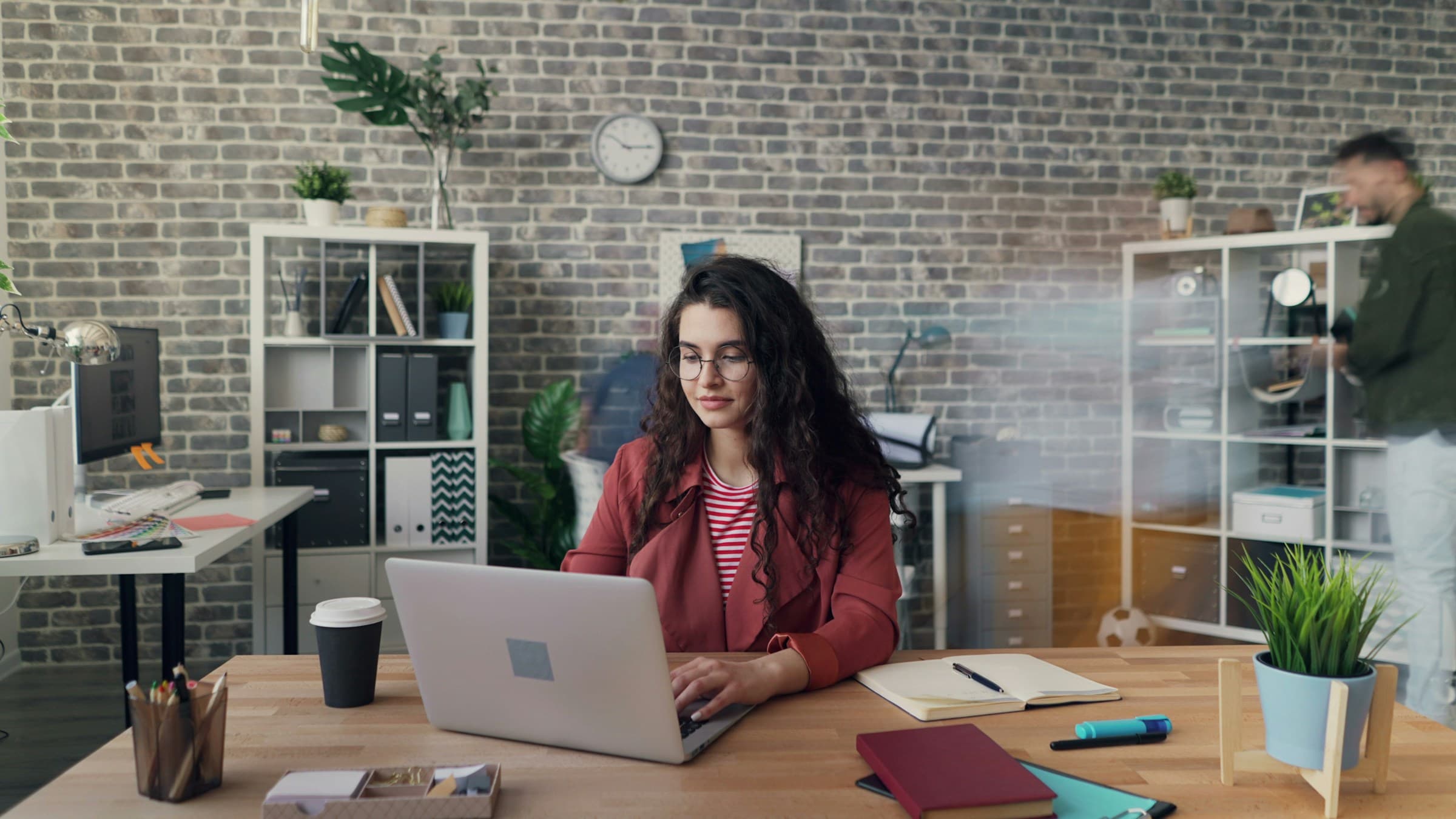 woman creating email templates - Shopify Email Templates