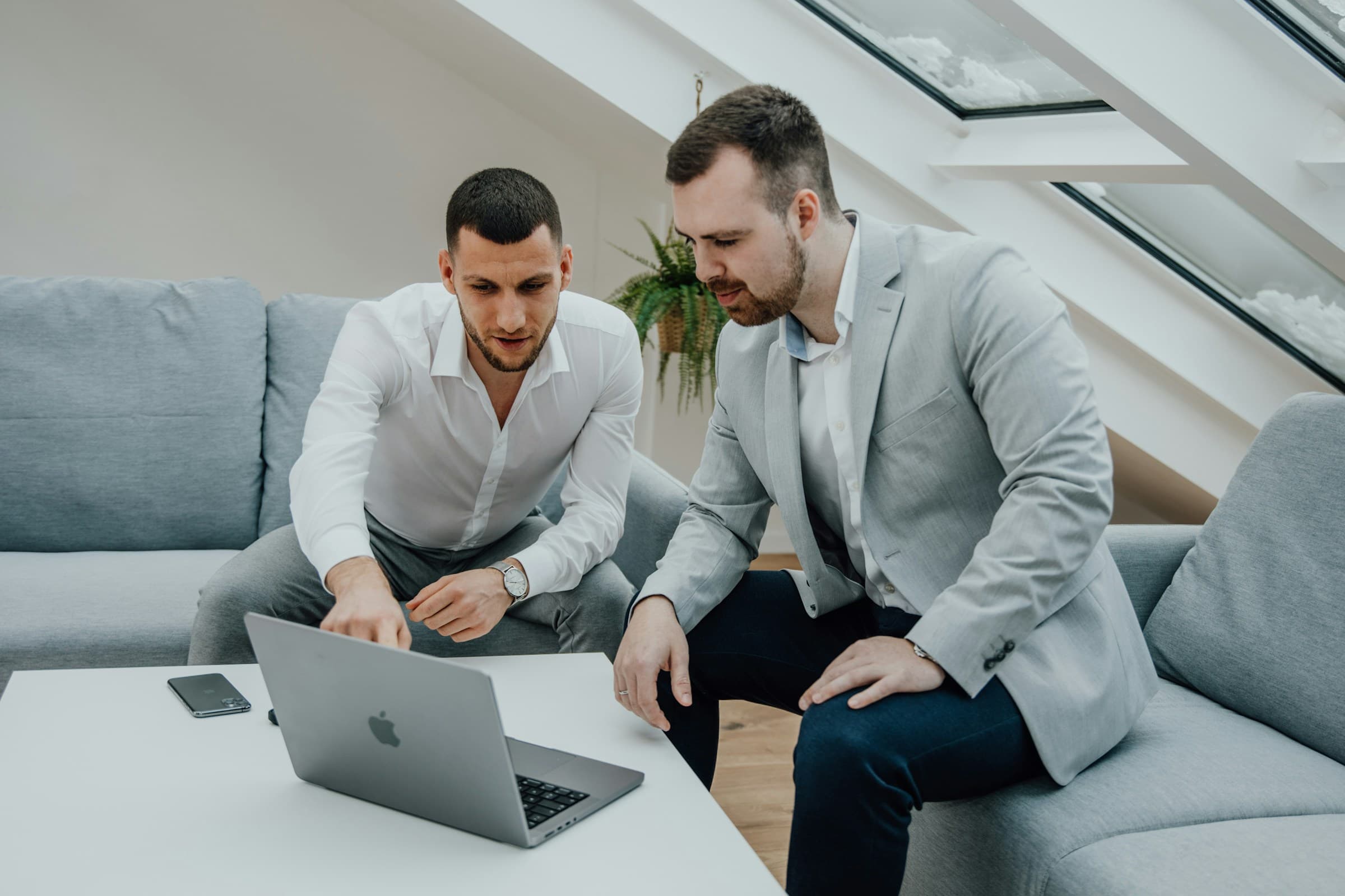 person sitting with a friend - Shopify Landing Pages