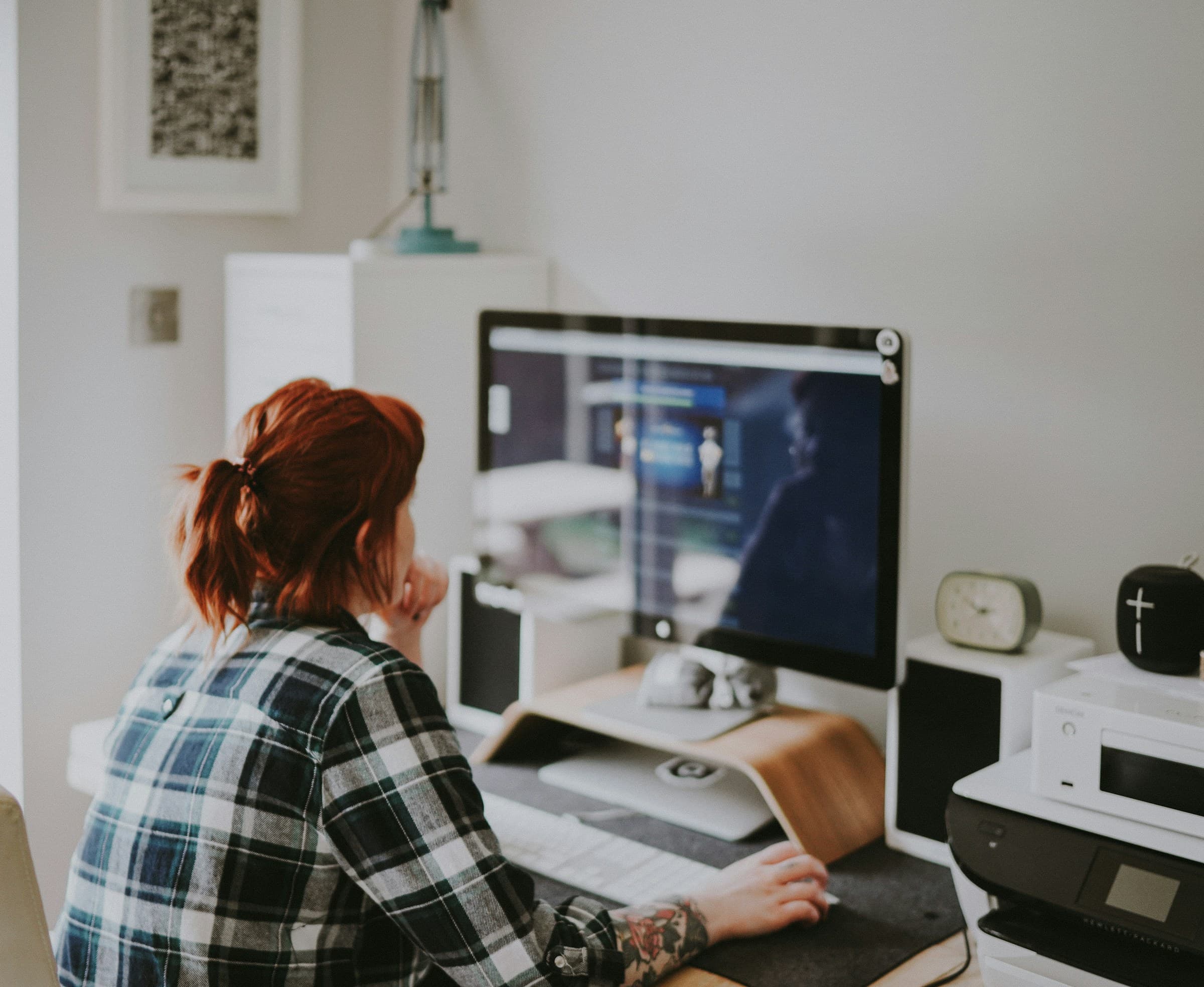 woman focused on work - Shopify Pages