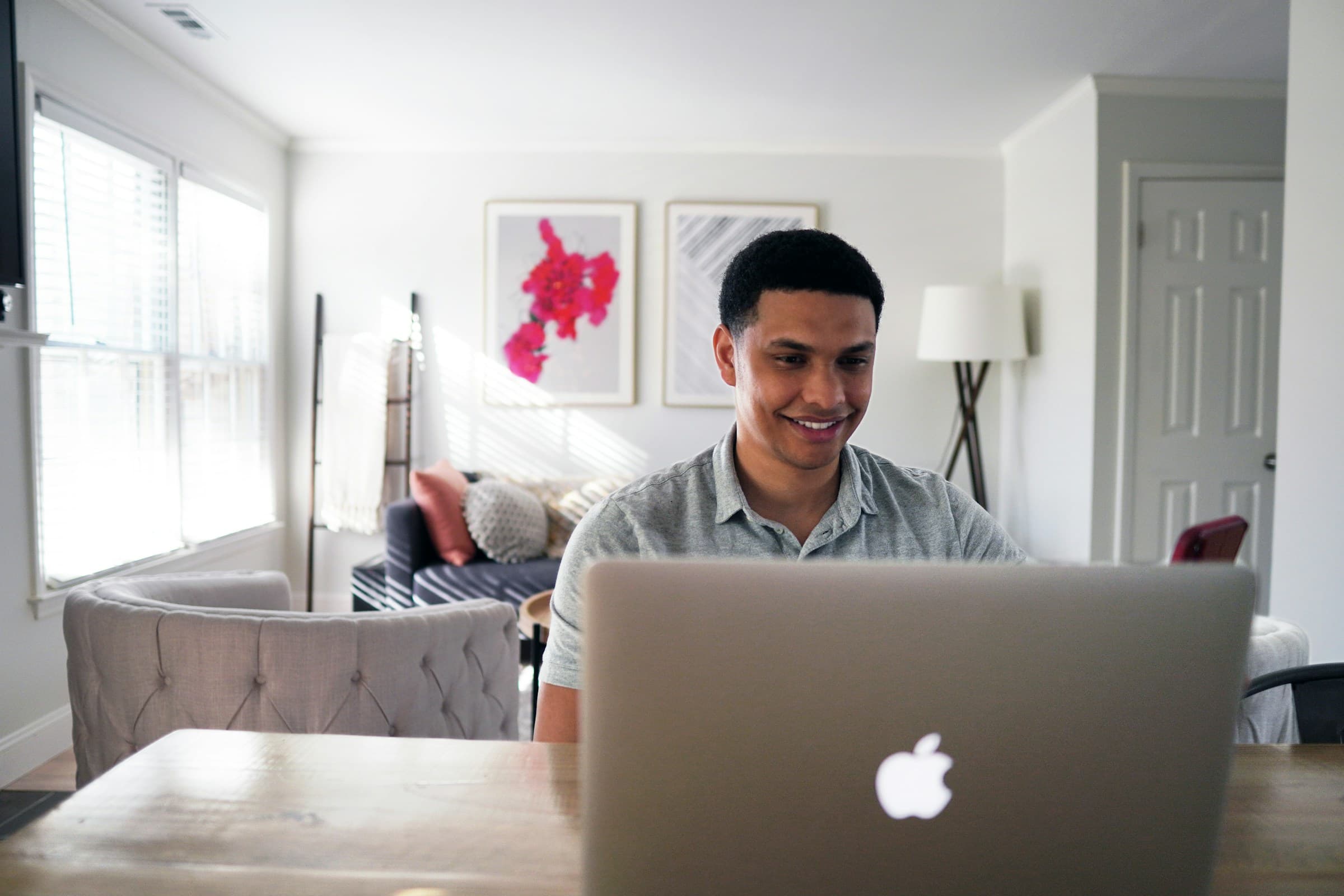person working on laptop - Shopify Pages